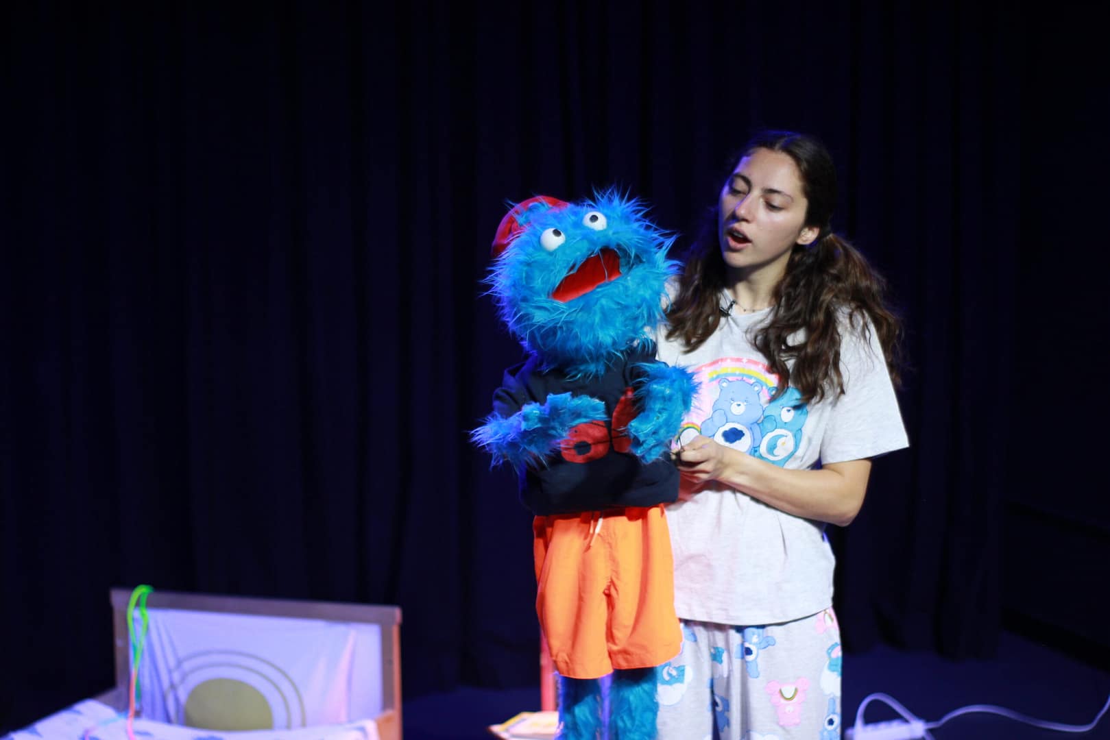 IMG 4293 scaled blue monster puppet with actress - joyful education